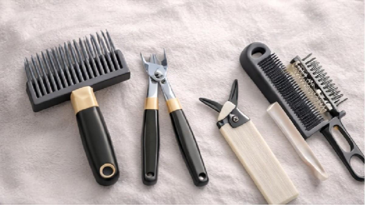 cat grooming tools including brush,wide tooth comb, flea comb, nail clippers